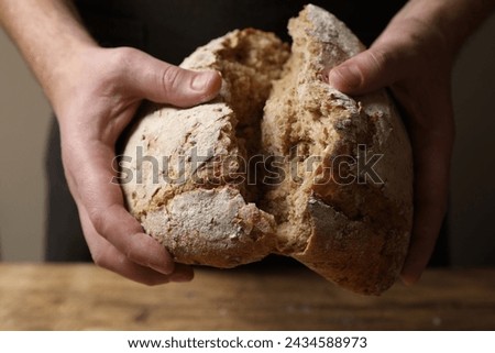 Similar – Image, Stock Photo A loaf of bread, a glass of jam and butter on a golden plate, rustic style