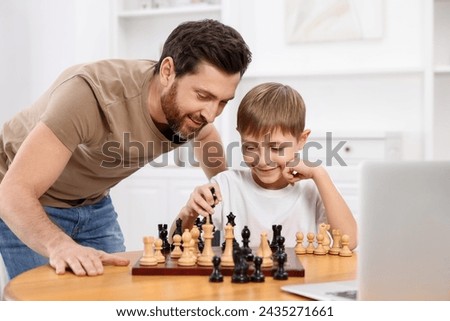 Similar – Image, Stock Photo Father playing with his little son at home