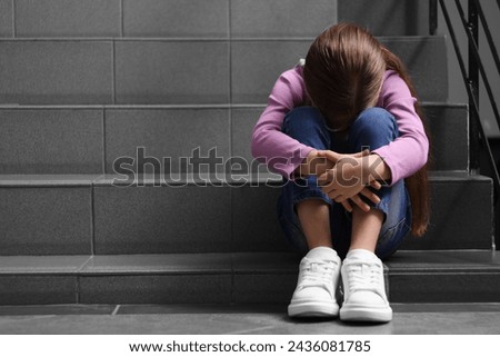 Similar – Image, Stock Photo Lonely kid in the middle of a bridge