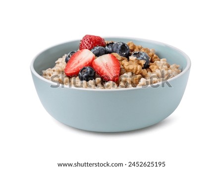 Similar – Image, Stock Photo Healthy breakfast. Bowl with cereals, raspberries and blueberries next to oranges