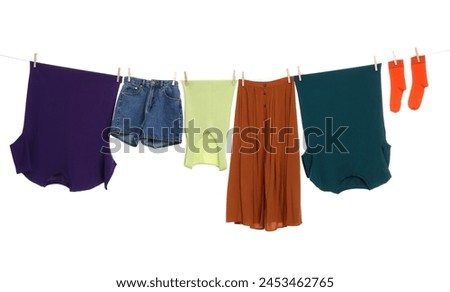 Similar – Image, Stock Photo Colorful Clothes Hanging For Sale