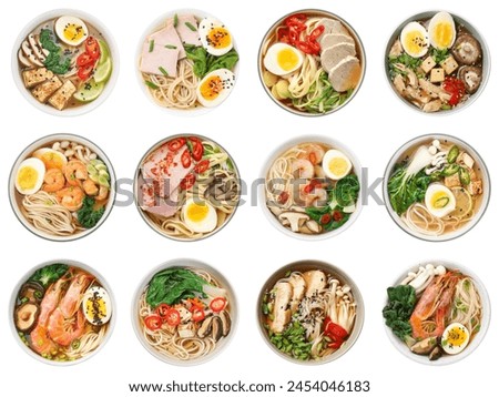 Similar – Image, Stock Photo Bowls with Asian soup with noodle, cabbage, mushrooms, shiitake, garlic, chili and dumpling in traditional crockery with chopsticks on dark concrete table. Food banner with healthy ramen noodles. Top view