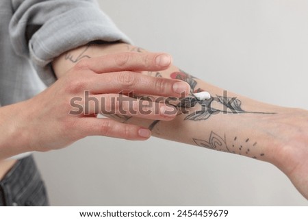 Similar – Image, Stock Photo Stylish tattooed woman on street