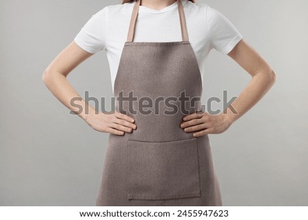 Similar – Image, Stock Photo A stylish chef in a black jacket prepares tasty salad with ripe figs, goat Chevre cheese, fresh cucumber roll, beetroot and mustard leaves with tomato sauce. Restaurant dish. Delicious food