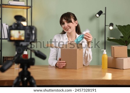 Similar – Image, Stock Photo Fashion blogger recording video at home