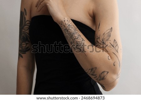 Similar – Image, Stock Photo Stylish tattooed woman on street