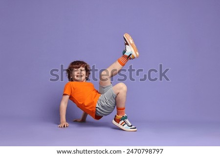 Similar – Image, Stock Photo Little boy with a surfboard on the beach