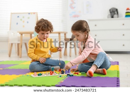 Similar – Image, Stock Photo baby playing on the floor II