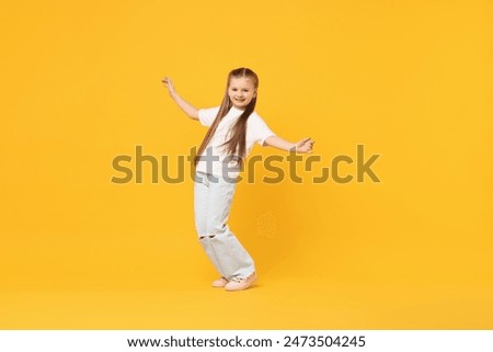 Similar – Image, Stock Photo happy kid girl in blue dress and straw walking on summer sunny meadow. Lifestyle shot, rural living and summer traveling concept