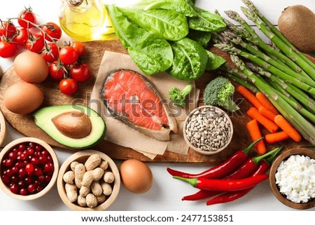 Similar – Image, Stock Photo Set of ingredients in bowls and spoons for cooking muffins