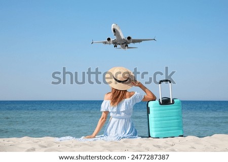 Similar – Image, Stock Photo Woman resting on sandy beach on cloudy day