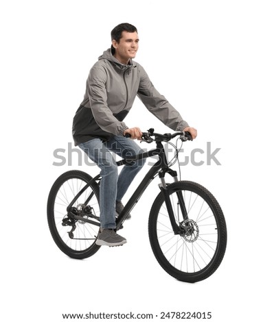 Similar – Image, Stock Photo healthy man riding a bicycle on a mountain road in a sunny day