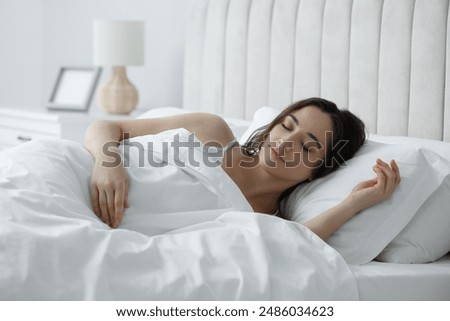 Image, Stock Photo Woman sleeping in bed 20