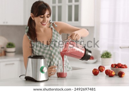 Similar – Image, Stock Photo Strawberry smoothie in a botle with pink background and pink paper straws.