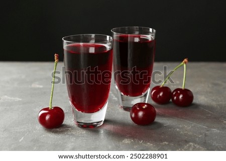 Similar – Image, Stock Photo a cherry liqueur and a beer on the pub table with tablecloth