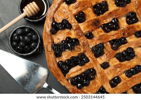 Similar – Foto Bild Blaubeerkuchen und Zutaten. Herstellung von Blaubeerkuchen mit Gitterkruste