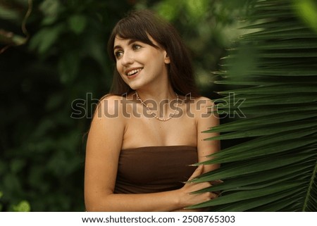 Similar – Image, Stock Photo Smiling woman near tree in park