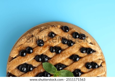 Similar – Foto Bild Blaubeerkuchen und Zutaten. Herstellung von Blaubeerkuchen mit Gitterkruste