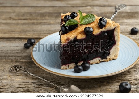 Similar – Foto Bild Blaubeerkuchen und Zutaten. Herstellung von Blaubeerkuchen mit Gitterkruste