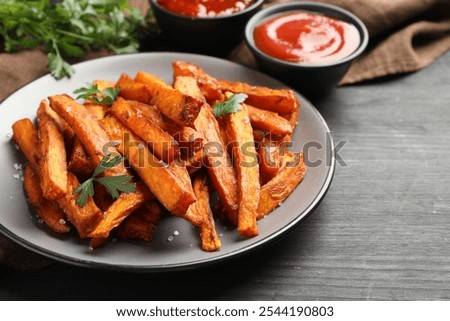 Similar – Foto Bild Süßkartoffelpommes in einer Schüssel auf dem Tisch