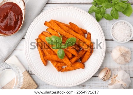 Similar – Foto Bild Süßkartoffelpommes in einer Schüssel auf dem Tisch