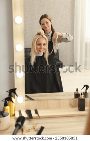 Similar – Image, Stock Photo Hairdresser and client at hair salon