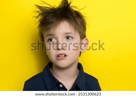 Similar – Image, Stock Photo Boy looking at a smartphone
