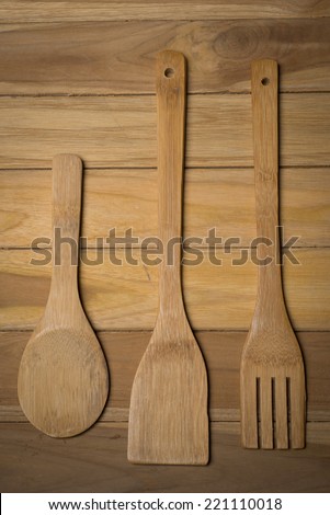 kitchenware on wood background