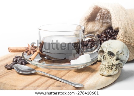 Coffee cup and beans with death skull