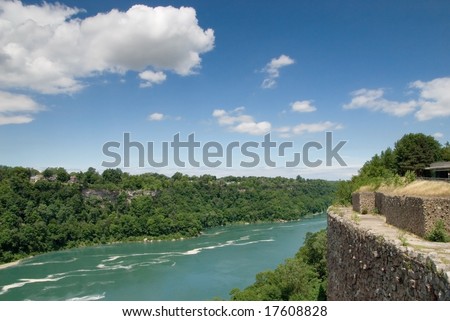 Summer view of Niagara River Gorge natural international border with Canada on left and USA on right.