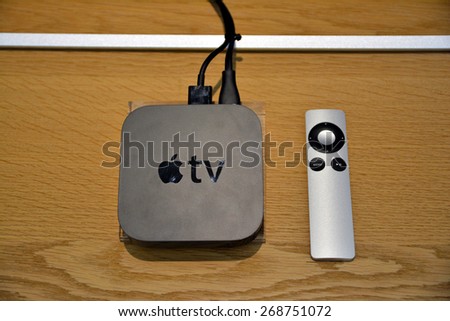 11 April 2015 - Istanbul, Turkey: View of a third generation Apple TV and its remote control. The Apple TV is a digital media player developed by Apple Inc.