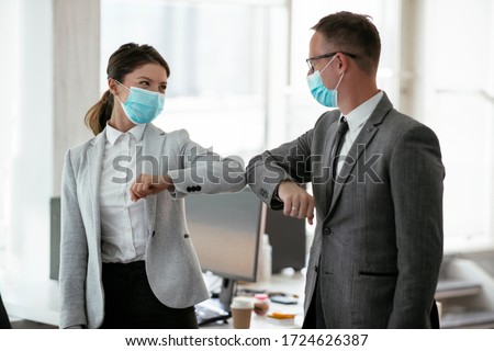 Similar – Image, Stock Photo Businesswoman Wearing Mask Working In Socially Distanced Cubicle In Office During Health Pandemic