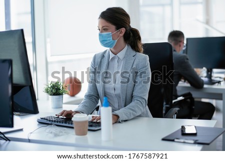 Similar – Image, Stock Photo Woman disinfecting phone with antiseptic wet wipe. Antiseptic napkin to prevent spread of germs, bacteria and coronavirus. Coronavirus prevention. Prevent illness coronavirus after public place.