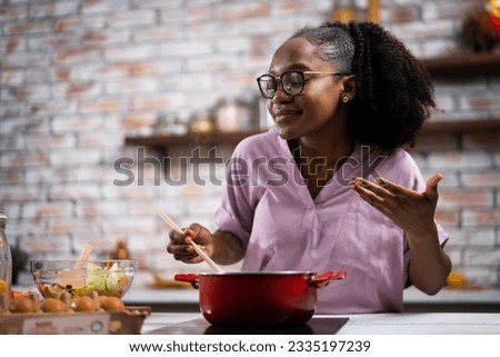 Similar – Image, Stock Photo Young black woman with eyes closed against wall