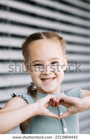 Similar – Image, Stock Photo Little artists gesturing heart and smiling