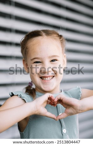 Similar – Image, Stock Photo Little artists gesturing heart and smiling