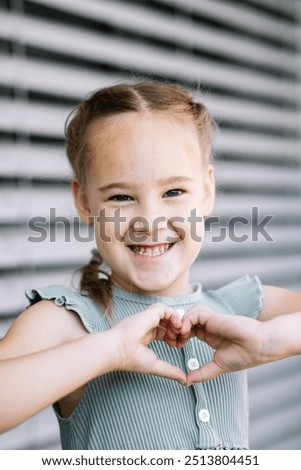 Similar – Image, Stock Photo Little artists gesturing heart and smiling