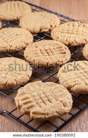 Peanut Butter Cookies cooling on a rack.