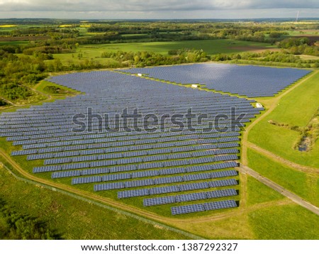 Similar – Foto Bild Droneshot einer Solarpanel-Farm erzeugt grünen Strom