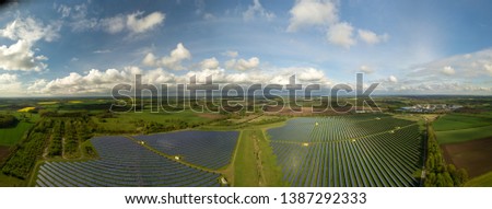 Similar – Foto Bild Droneshot einer Solarpanel-Farm erzeugt grünen Strom