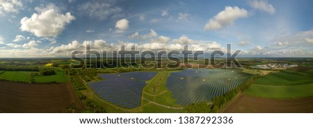 Similar – Foto Bild Droneshot einer Solarpanel-Farm erzeugt grünen Strom