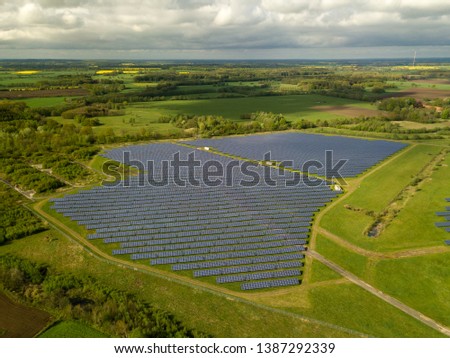 Similar – Foto Bild Droneshot einer Solarpanel-Farm erzeugt grünen Strom