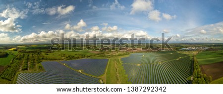 Similar – Foto Bild Droneshot einer Solarpanel-Farm erzeugt grünen Strom