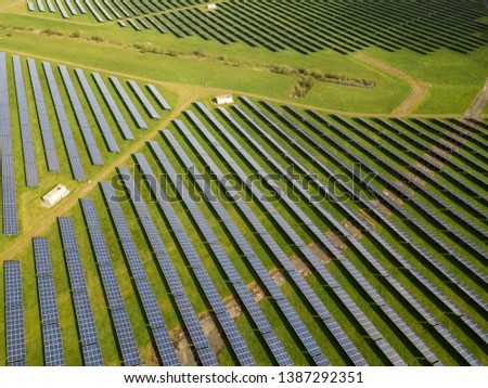 Similar – Foto Bild Droneshot einer Solarpanel-Farm erzeugt grünen Strom