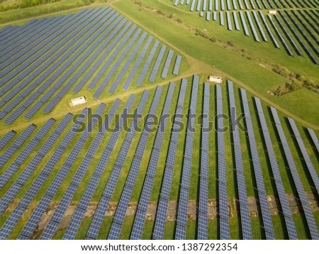 Similar – Foto Bild Droneshot einer Solarpanel-Farm erzeugt grünen Strom