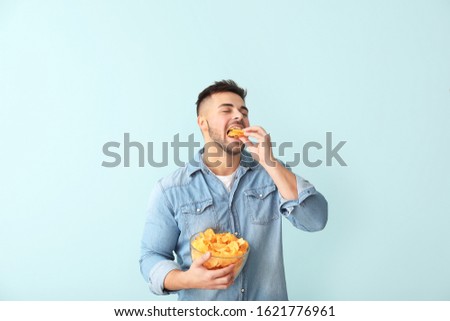 Similar – Image, Stock Photo Tasty potato chips in bowl on table