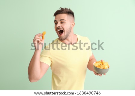 Similar – Image, Stock Photo Tasty potato chips in bowl on table