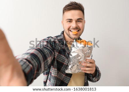 Similar – Image, Stock Photo Tasty potato chips in bowl on table