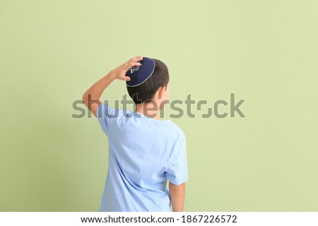 Cute Jewish boy on color background Stok fotoğraf © 