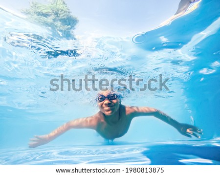 Similar – Foto Bild Kind schwimmt mit Tauchermaske